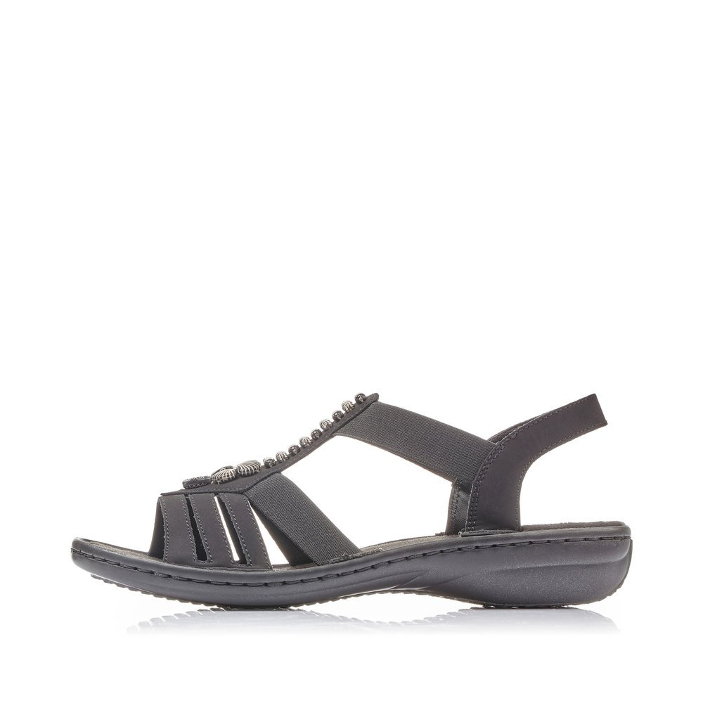 Night black Rieker women´s strap sandals 60806-00 with an elastic insert. Outside of the shoe.
