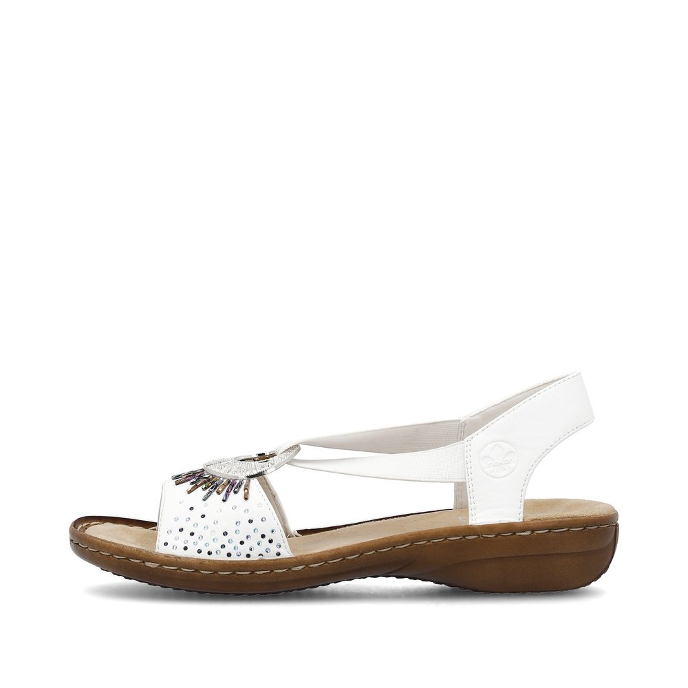 Pure white Rieker women´s strap sandals 60880-80 with an elastic insert. Outside of the shoe.