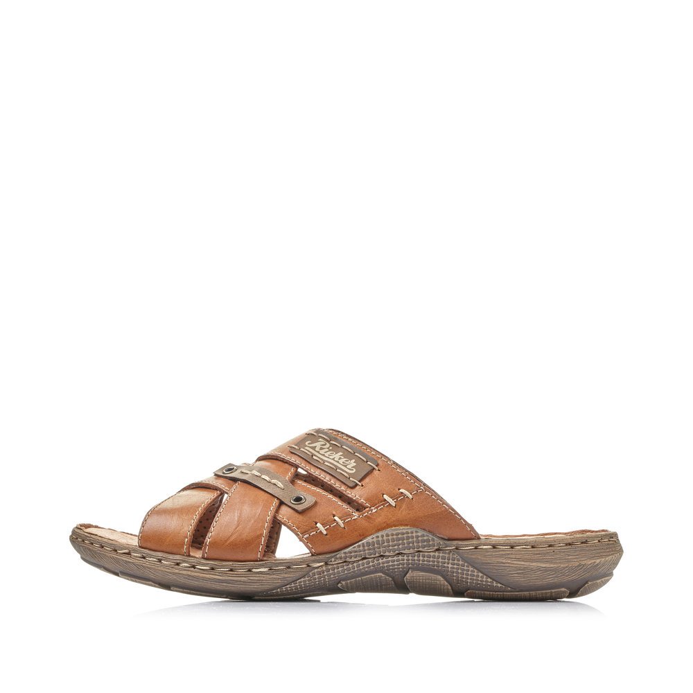 Rieker mules marron pour hommes 22090-25 avec la largeur confort G 1/2. Côté extérieur de la chaussure.