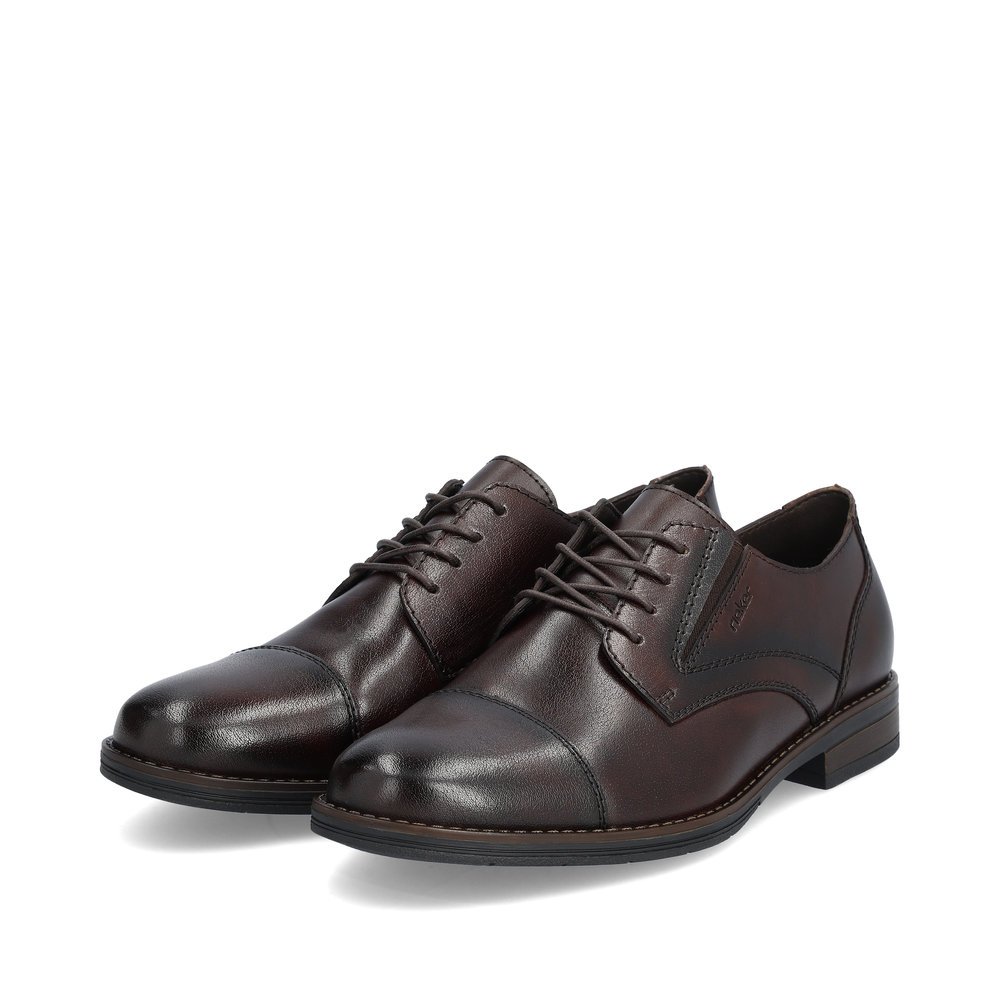 Dark brown Rieker men´s lace-up shoes 10307-25 with an elastic insert. Shoes laterally.