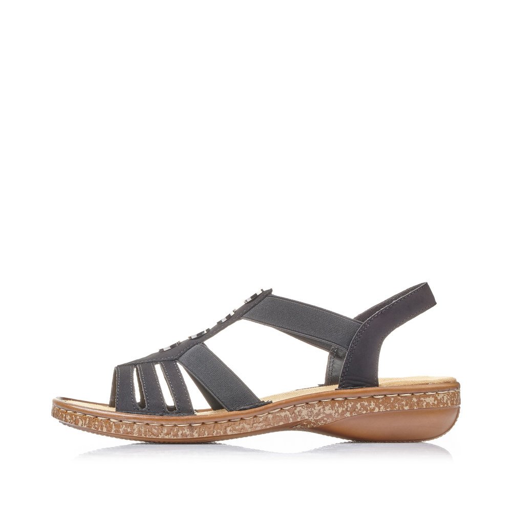 Night black Rieker women´s strap sandals 62831-00 with an elastic insert. Outside of the shoe.