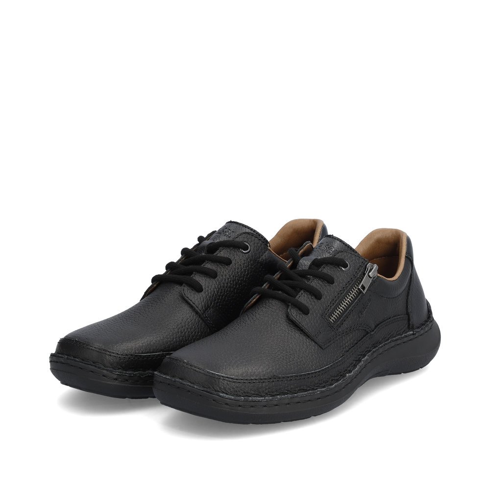 Black Rieker men´s lace-up shoes 03002-00 with zipper as well as extra width H. Shoes laterally.