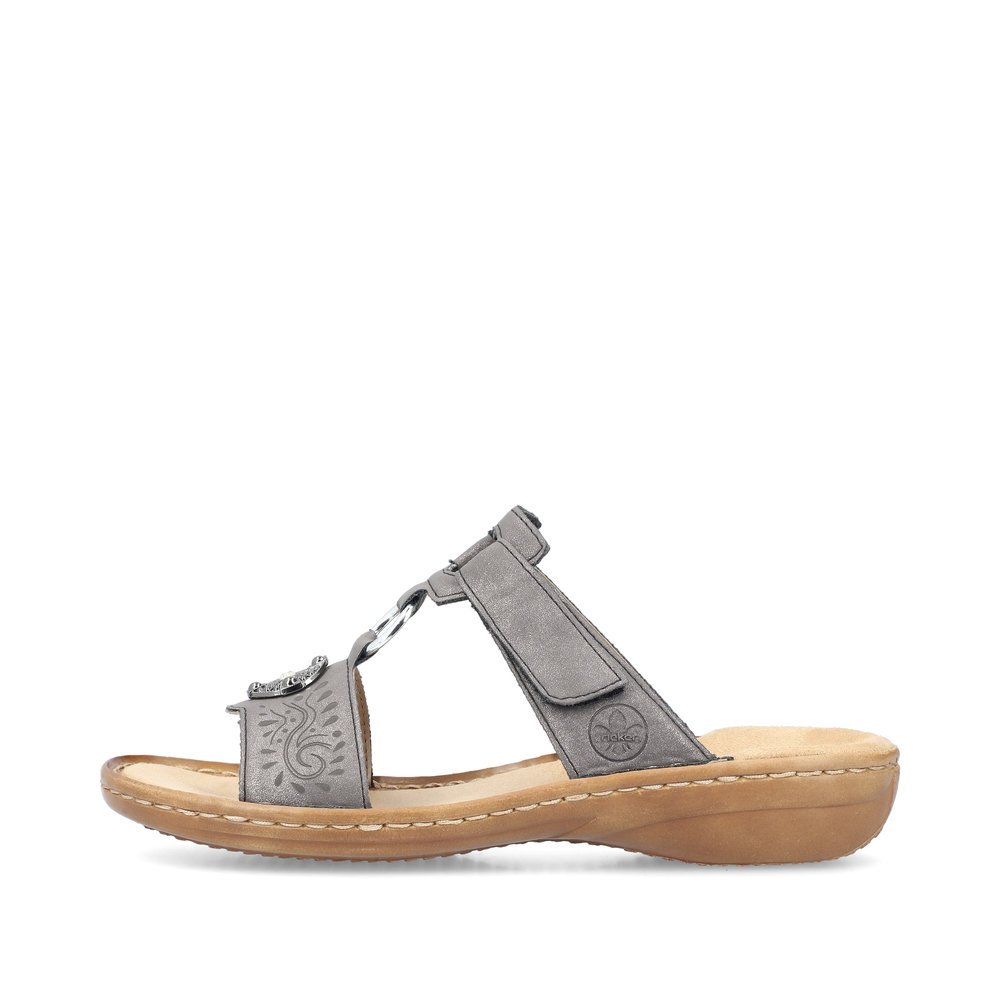 Platinum grey Rieker women´s mules 608K1-45 with a hook and loop fastener. Outside of the shoe.