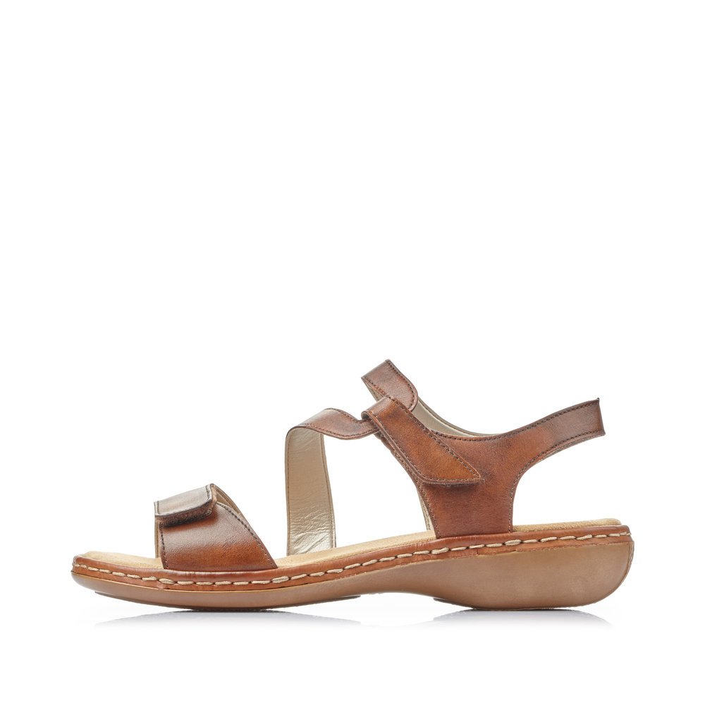 Nougat brown Rieker women´s strap sandals 659C7-24 with a hook and loop fastener. Outside of the shoe.