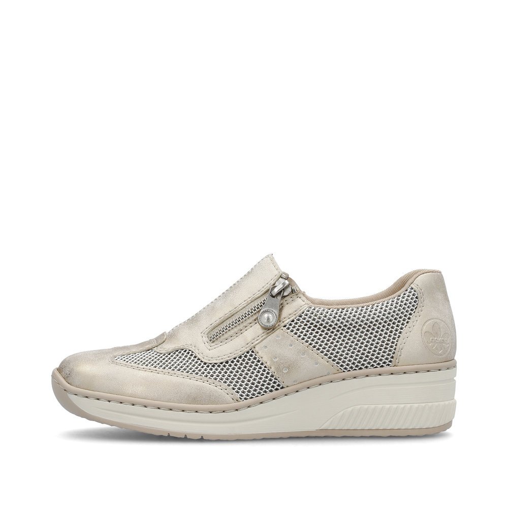 Beige Rieker women´s slippers 48760-60 with a zipper as well as perforated look. Outside of the shoe.