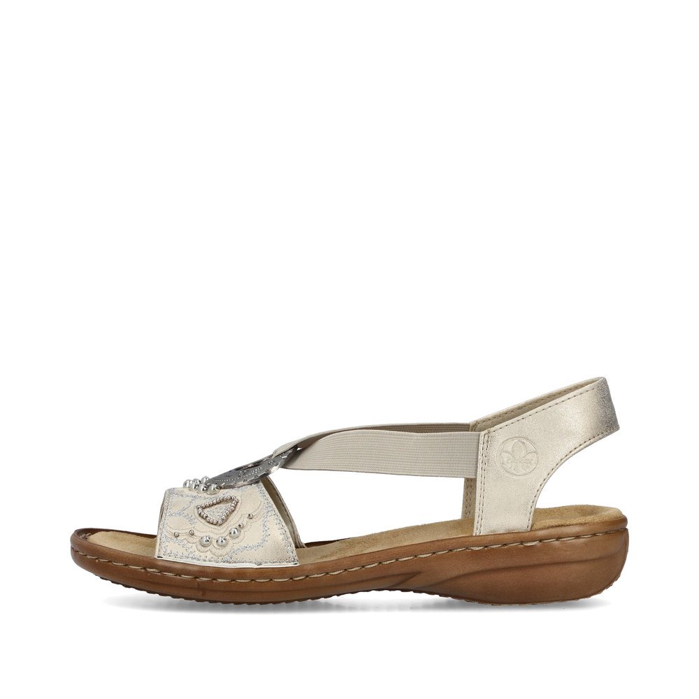 Light beige Rieker women´s strap sandals 608B9-60 with an elastic insert. Outside of the shoe.