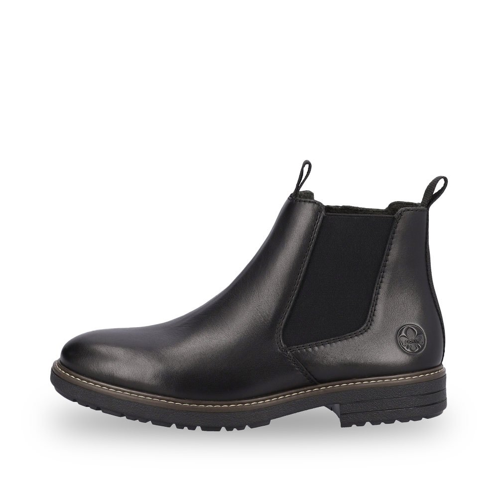 Midnight black Rieker men´s Chelsea boots 33180-00 with robust profile sole. The outside of the shoe
