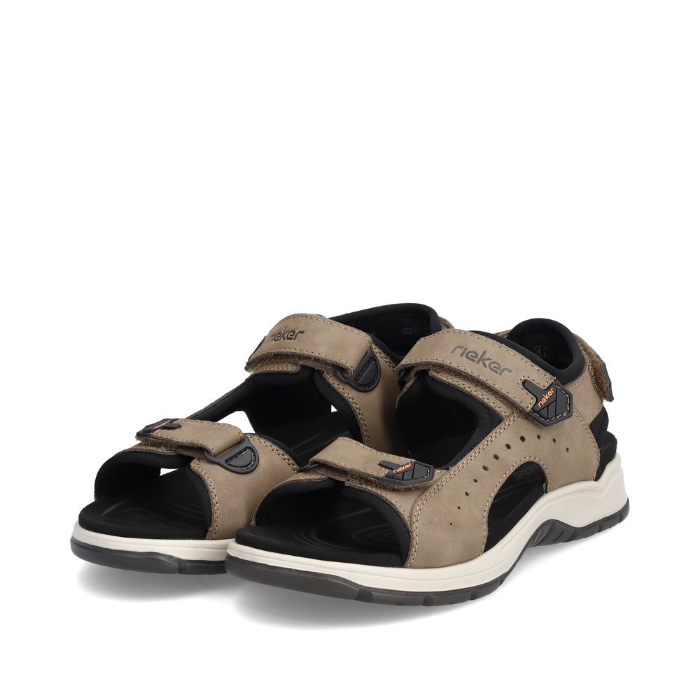 Brown Rieker men´s hiking sandals 26951-25 with a hook and loop fastener. Shoes laterally.