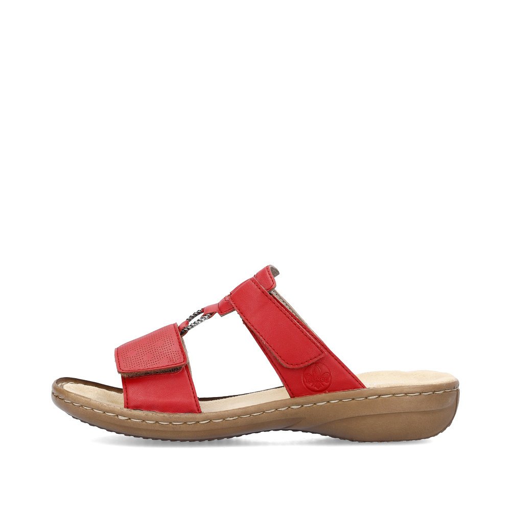 Cherry red Rieker women´s mules 60885-33 with a hook and loop fastener. Outside of the shoe.