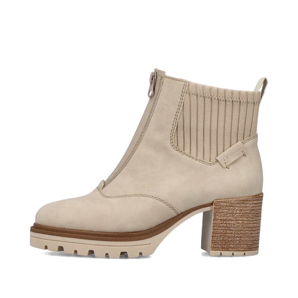 Grey beige Rieker women´s ankle boots Y9050-62 with profile sole with block heel. The outside of the shoe