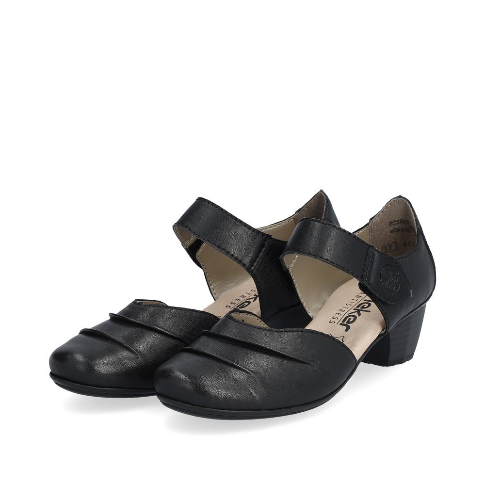 Jet black Rieker women´s pumps 41792-00 with a hook and loop fastener. Shoes laterally.