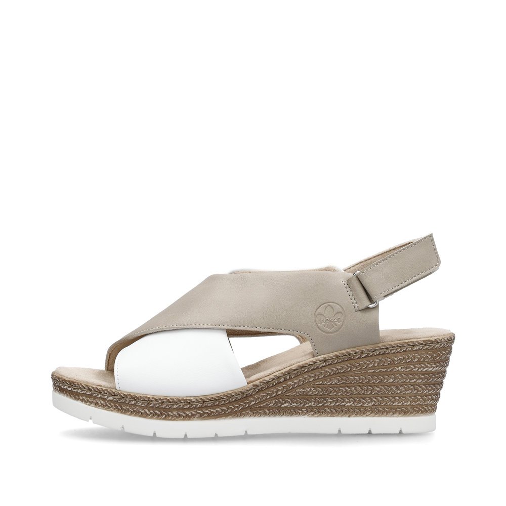 Beige Rieker women´s wedge sandals 61975-62 with a hook and loop fastener. Outside of the shoe.