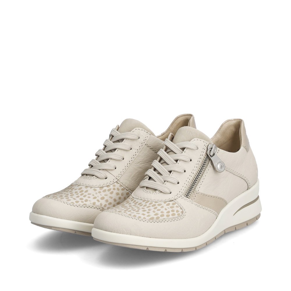 Beige Rieker women´s lace-up shoes L4821-60 with zipper as well as perforated look. Shoes laterally.