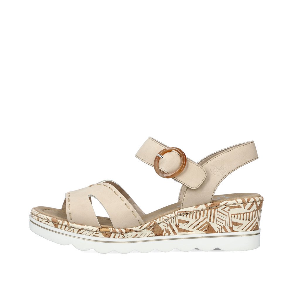 Beige Rieker women´s wedge sandals 67173-60 with a hook and loop fastener. Outside of the shoe.