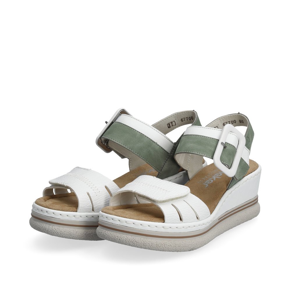 White Rieker women´s wedge sandals 67700-80 with a hook and loop fastener. Shoes laterally.