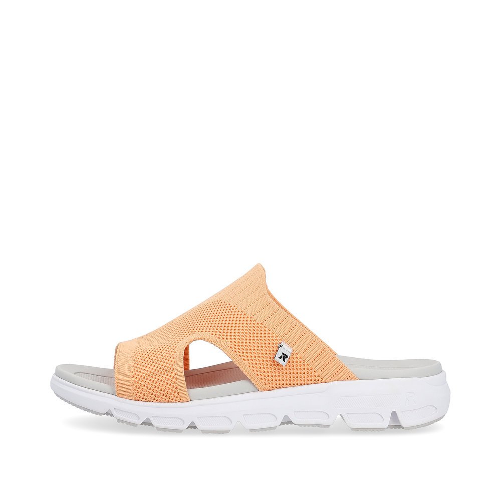 Orange washable Rieker women´s mules V8451-38 with a super light and flexible sole. Outside of the shoe.