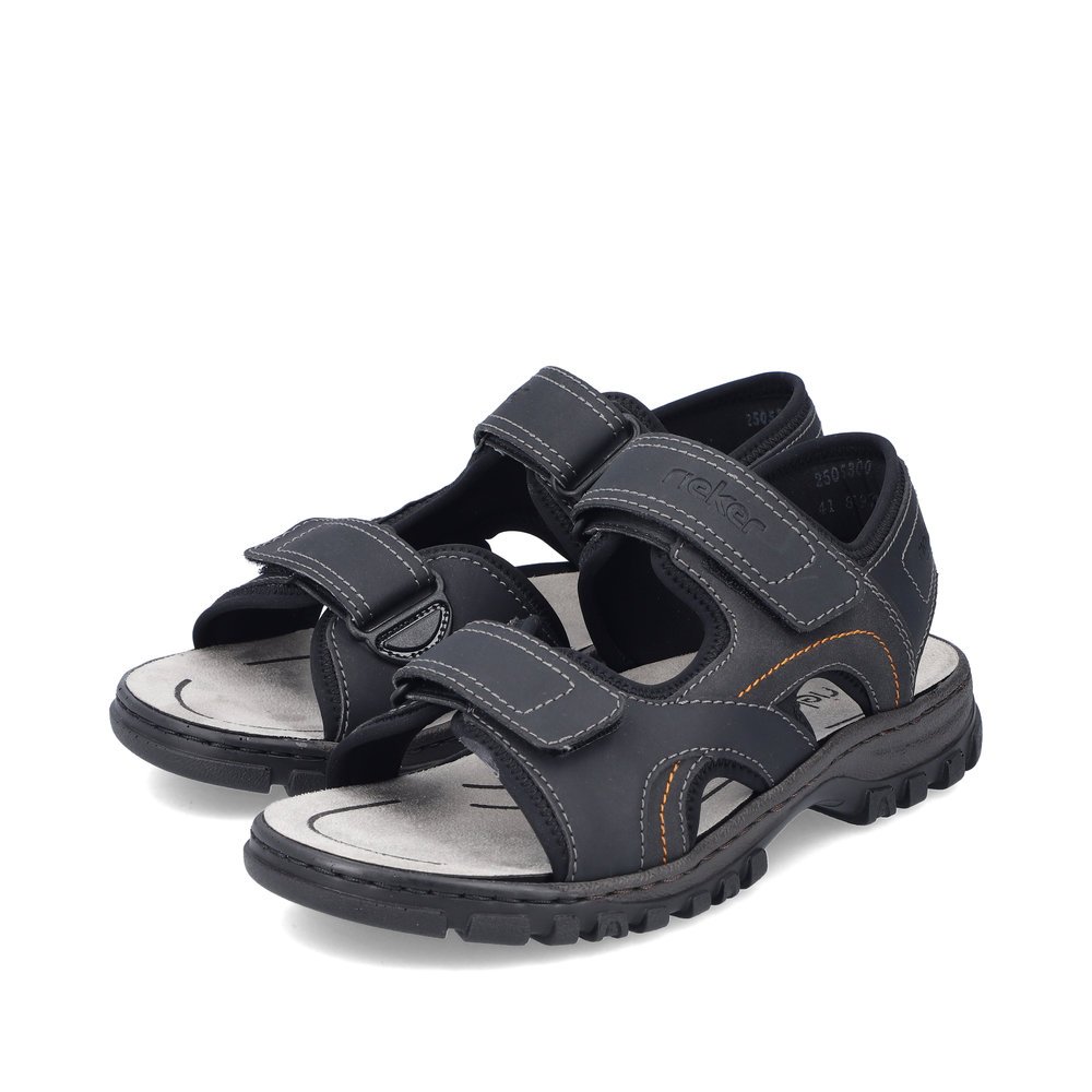 Black Rieker men´s hiking sandals 25053-00 with a hook and loop fastener. Shoes laterally.