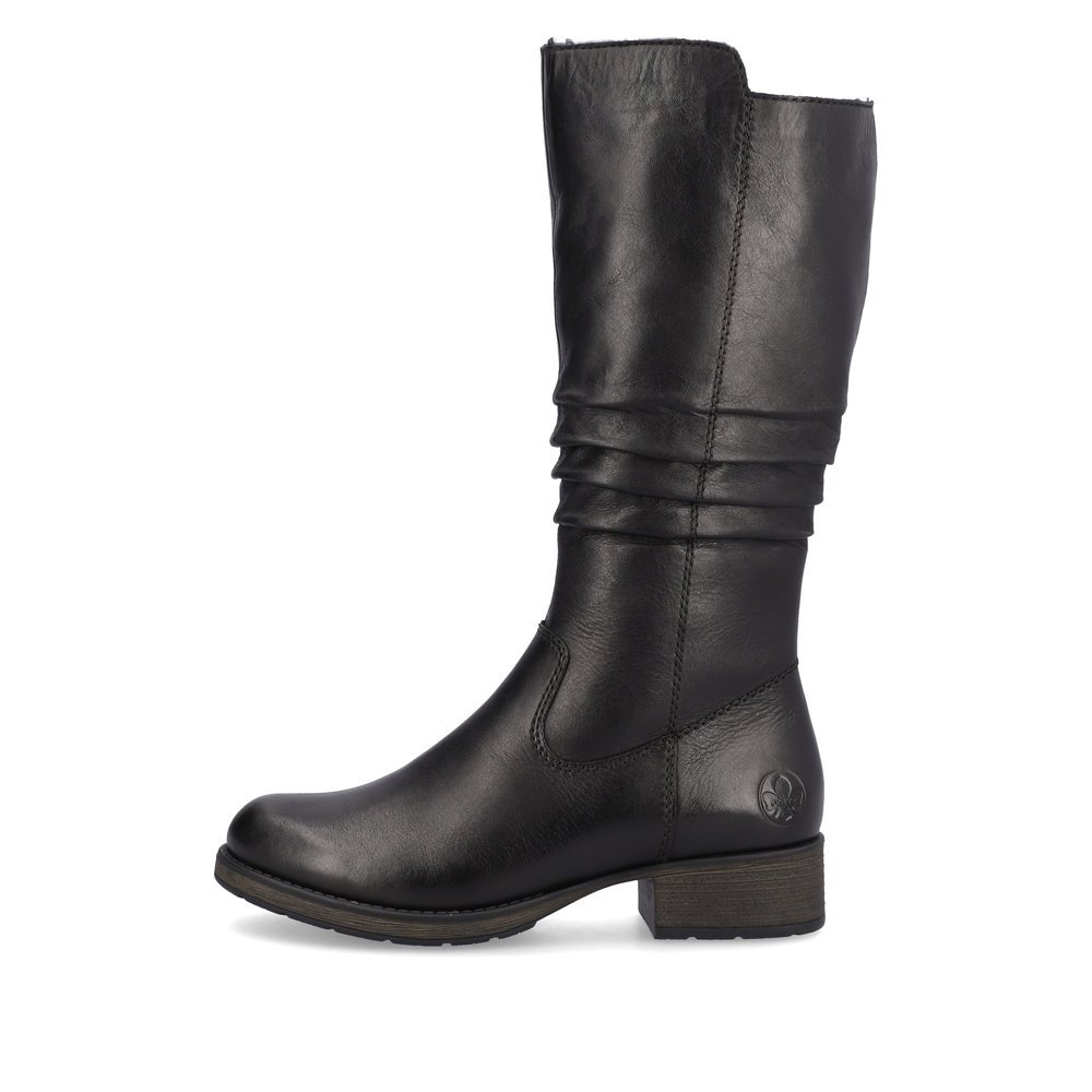 Jet black Rieker women´s high boots Z9563-00 with zipper as well as profile sole. The outside of the shoe