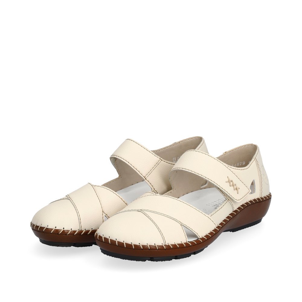 Light beige Rieker women´s ballerinas 44879-60 with a hook and loop fastener. Shoes laterally.
