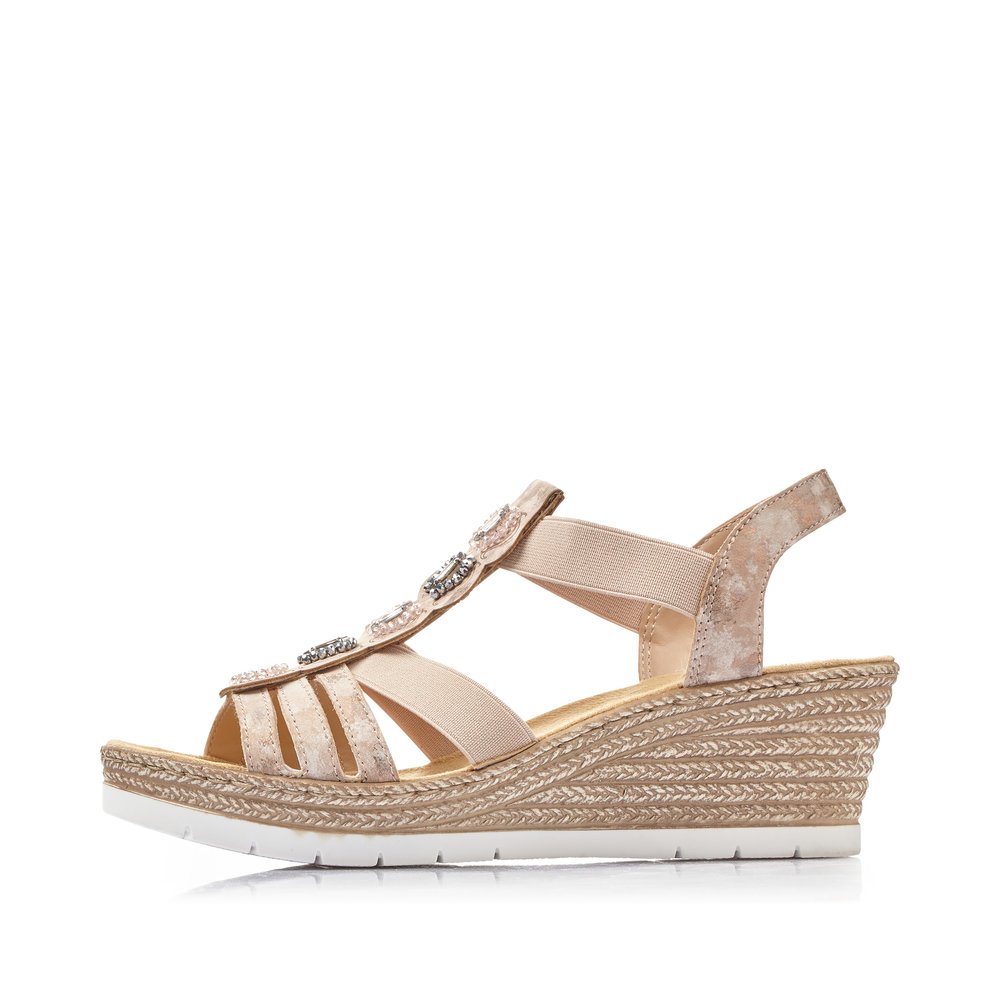 Pink Rieker women´s wedge sandals 619B2-31 with an elastic insert. Outside of the shoe.