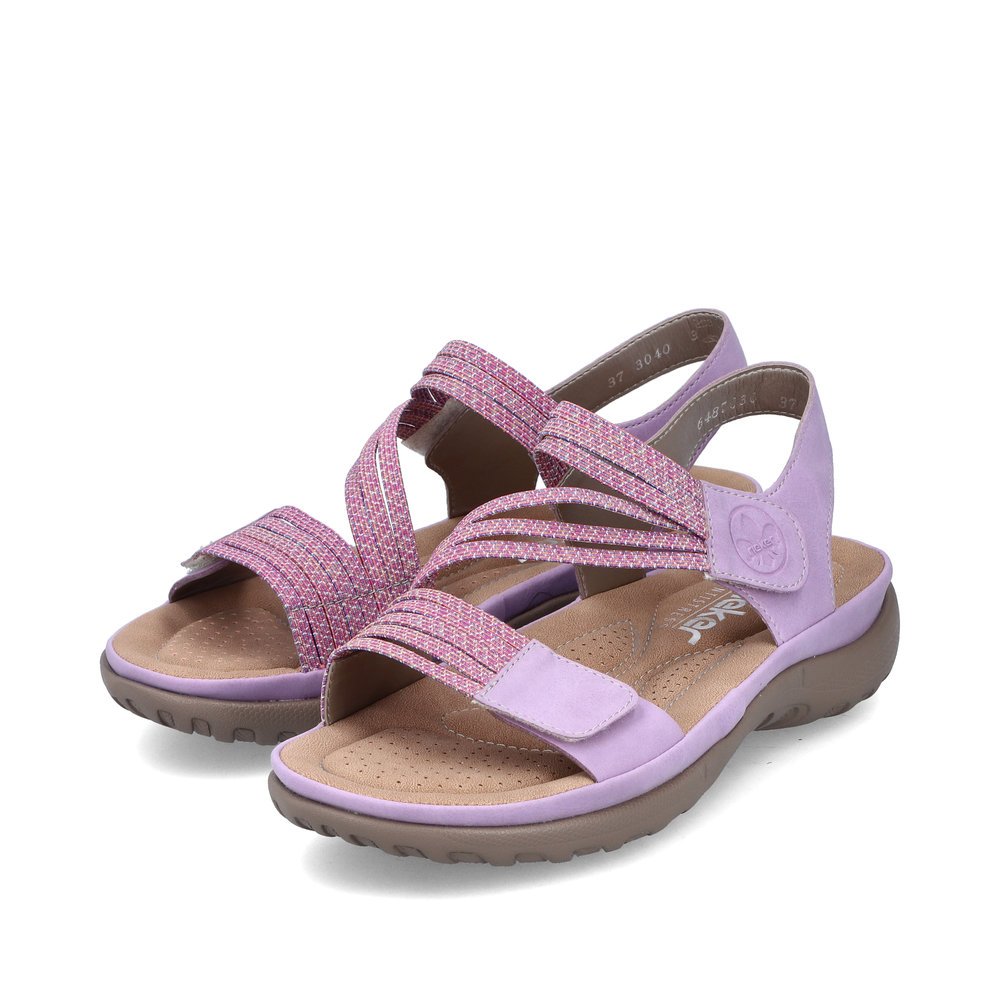 Pink Rieker women´s strap sandals 64870-30 with a hook and loop fastener. Shoes laterally.