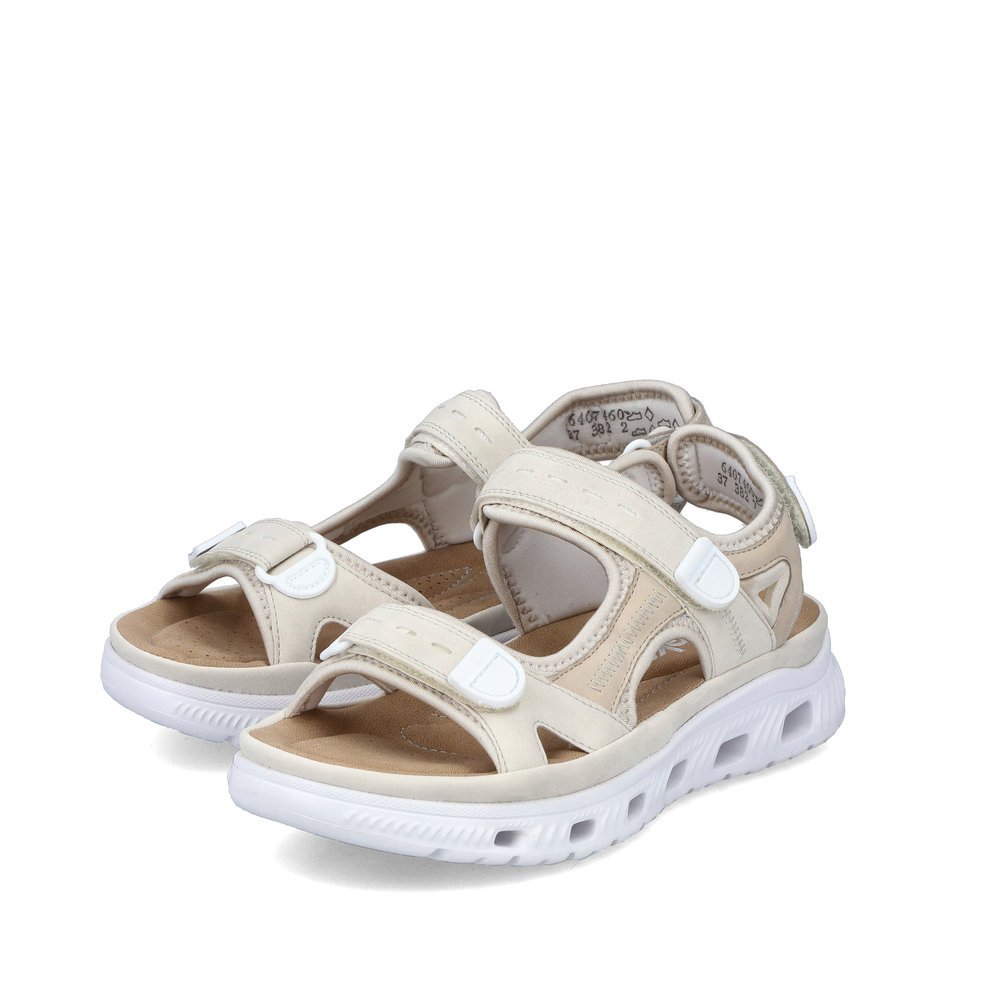 Beige Rieker women´s hiking sandals 64074-60 with an ultra light and flexible sole. Shoes laterally.