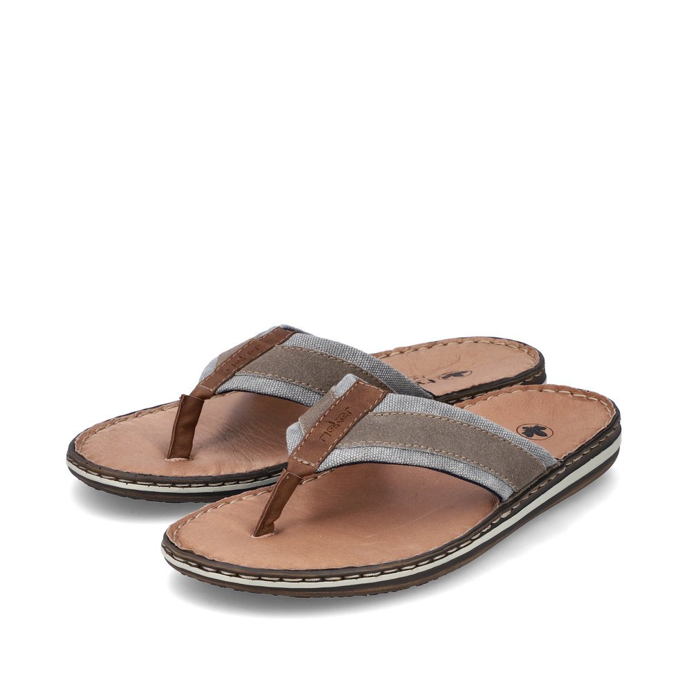Brown Rieker men´s flip flops 21095-42 with comfort width G as well as a light sole. Shoes laterally.