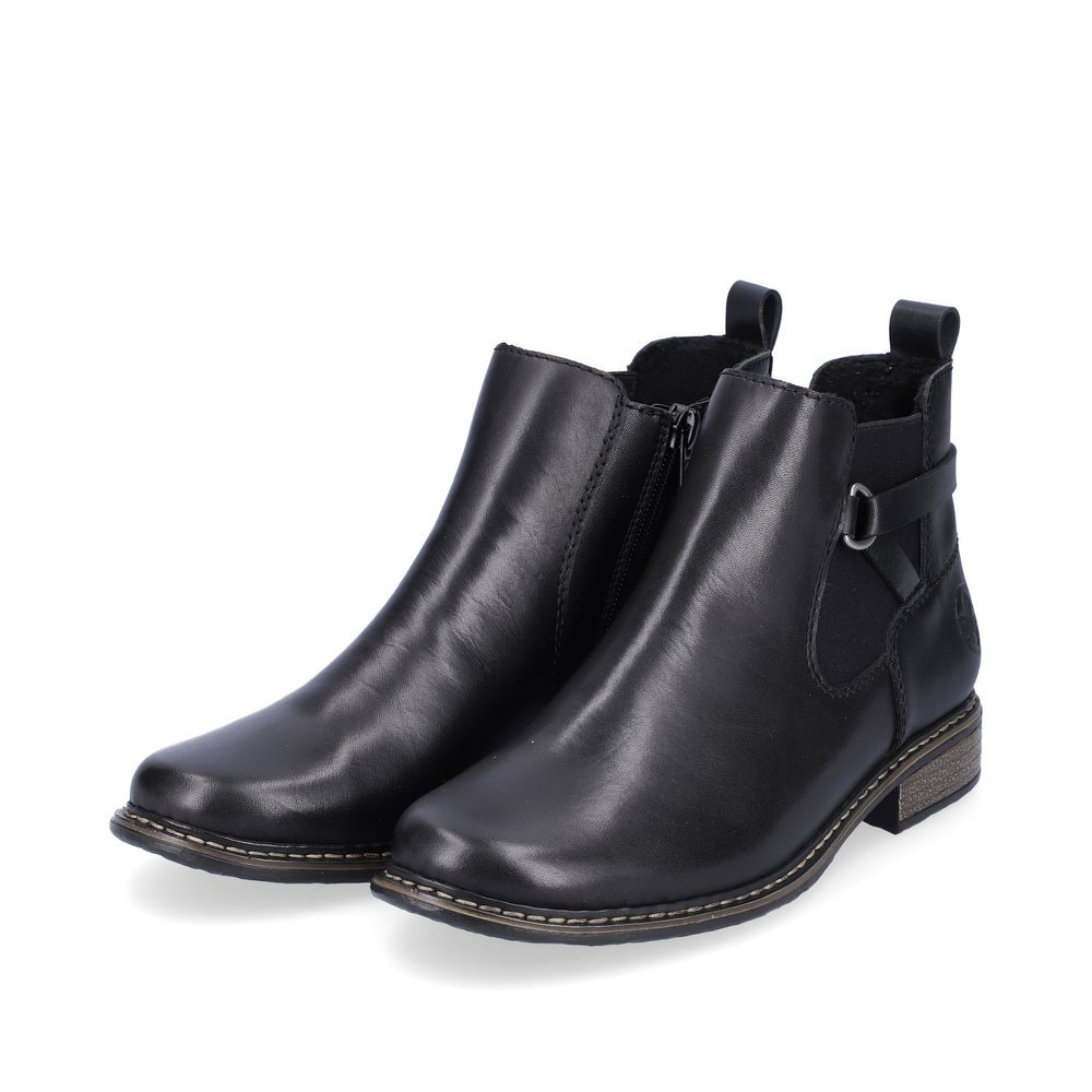Jet black Rieker women´s Chelsea boots Z4981-00 with a zipper as well as light sole. Shoe laterally