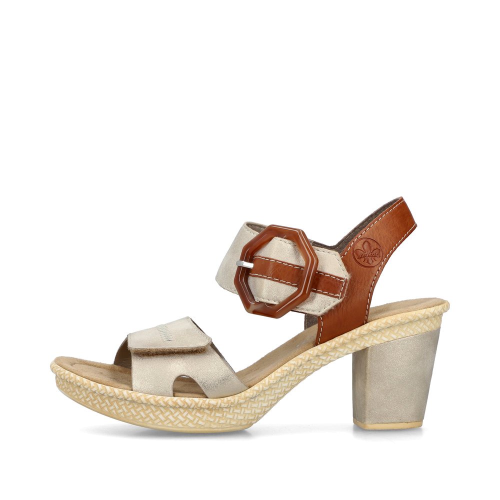 Beige Rieker women´s strap sandals 66576-60 with a hook and loop fastener. Outside of the shoe.