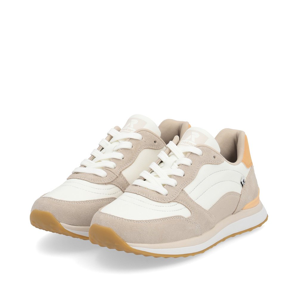 Beige Rieker women´s low-top sneakers 42506-82 with a super light and flexible sole. Shoes laterally.