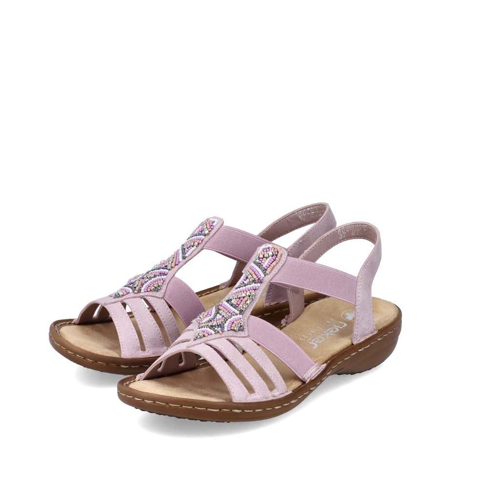 Pastel pink Rieker women´s strap sandals 60801-30 with an elastic insert. Shoes laterally.