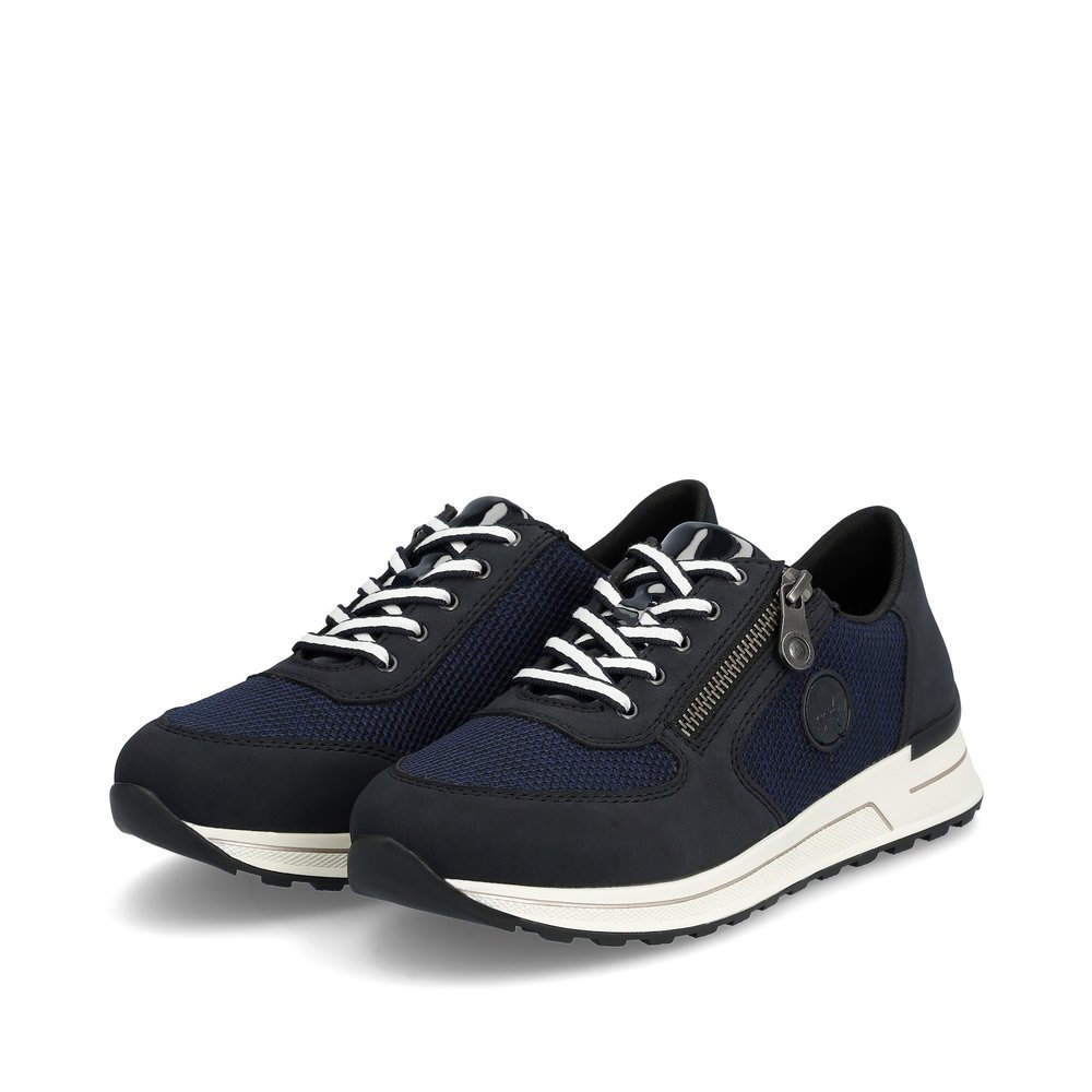 Blue Rieker women´s low-top sneakers N1411-14 with zipper as well as embossed logo. Shoes laterally.