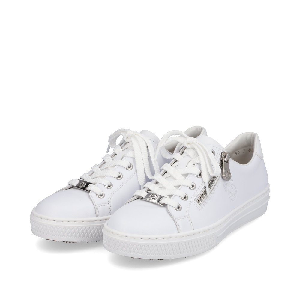 Classy white Rieker women´s low-top sneakers L59L1-83 with a zipper. Shoes laterally.