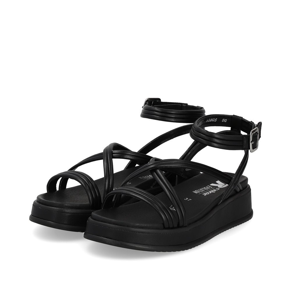 Rieker sandales à lanières noires femmes W0805-00 avec semelle à plateau. Chaussures inclinée sur le côté.