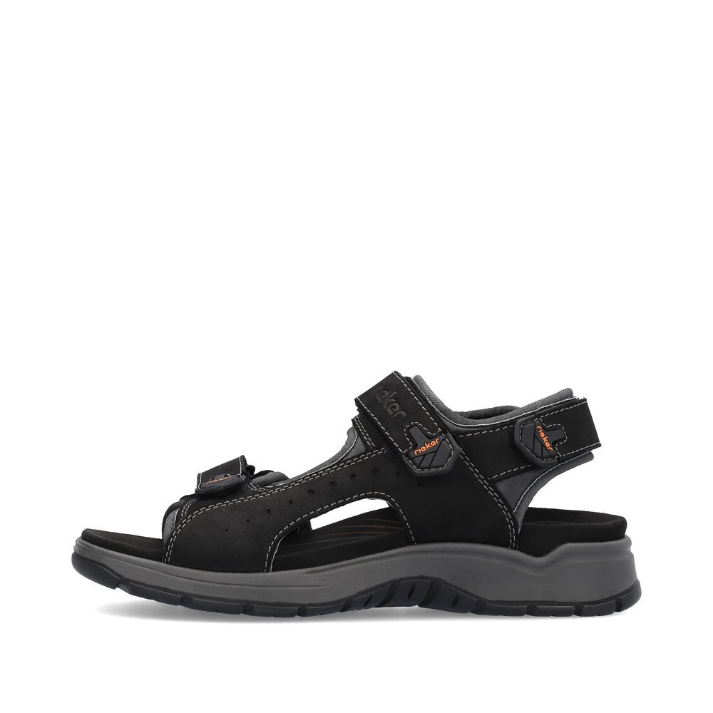 Black Rieker men´s hiking sandals 26951-00 with a hook and loop fastener. Outside of the shoe.