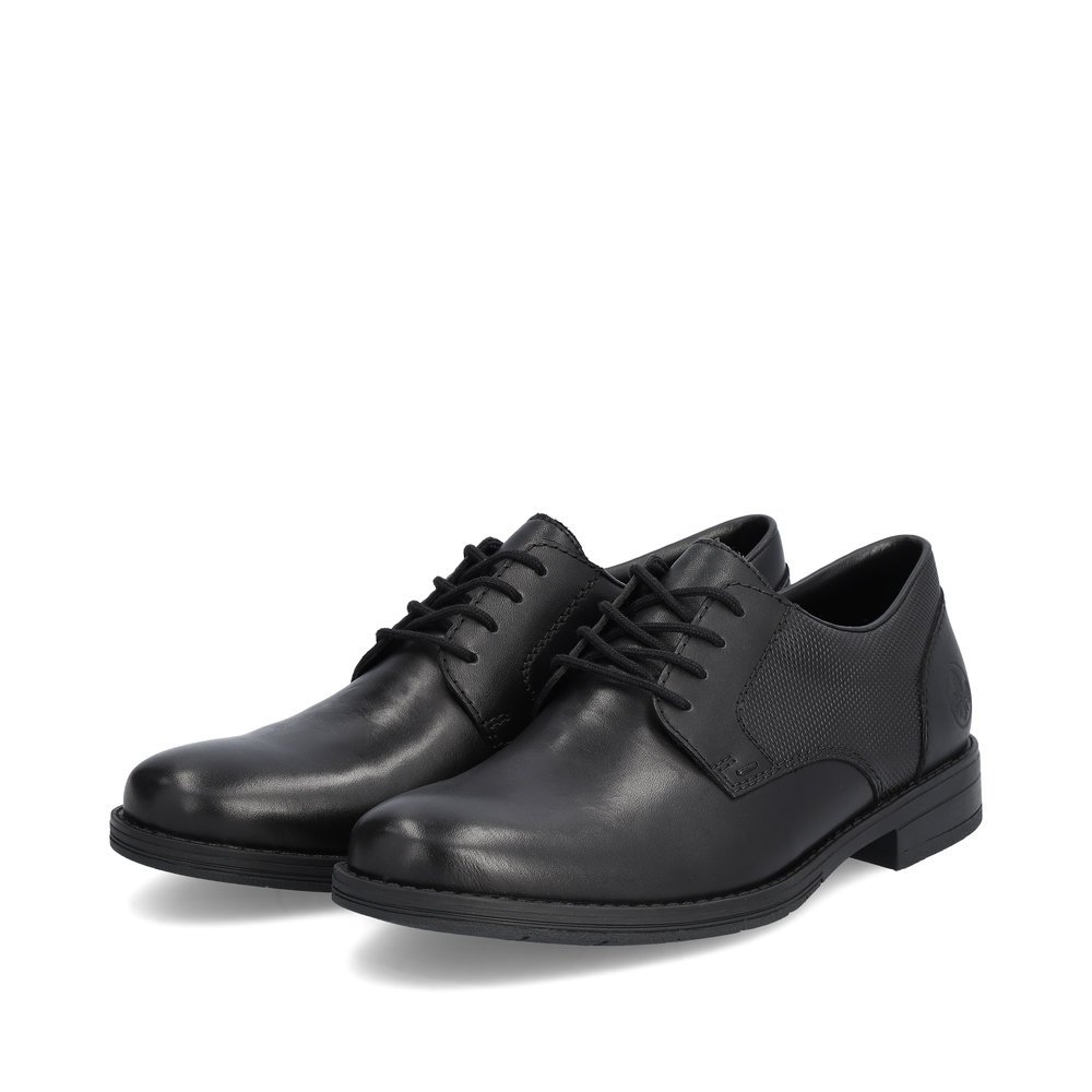 Jet black Rieker men´s lace-up shoes 10306-00 with the comfort width G 1/2. Shoes laterally.