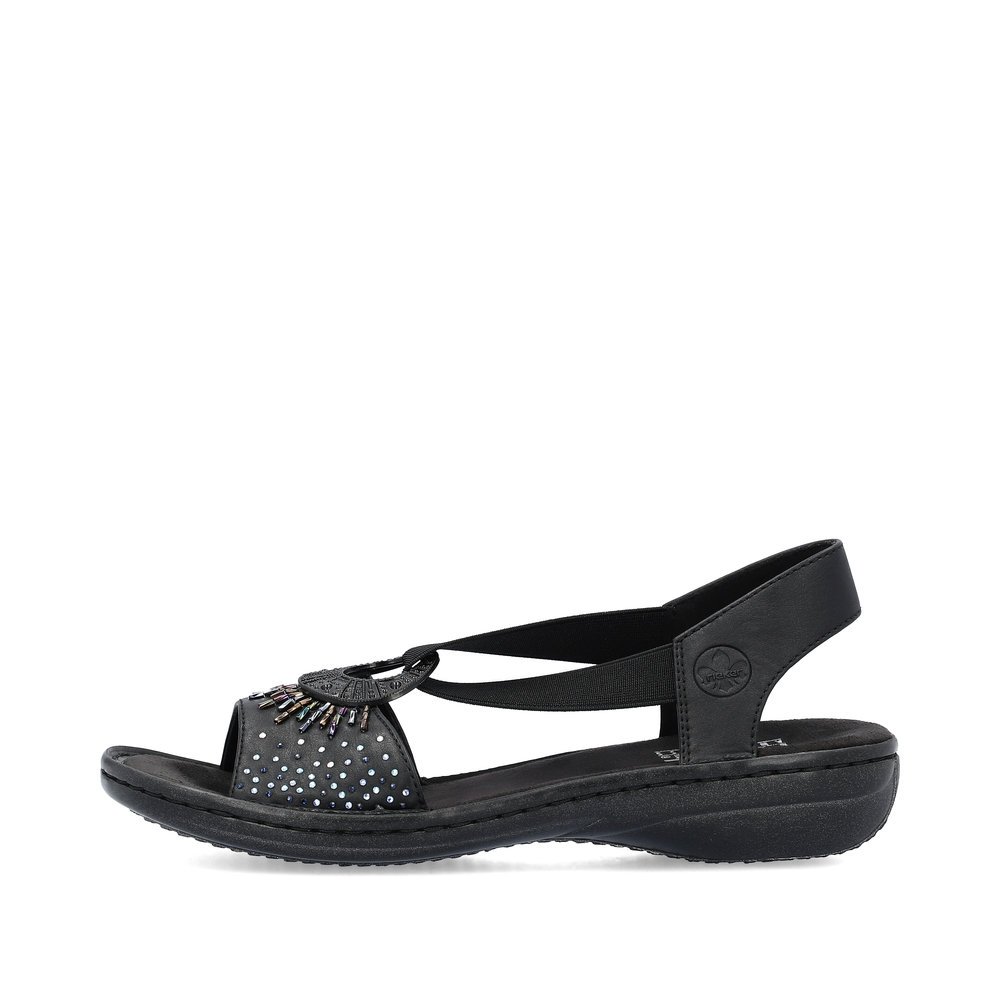 Black Rieker women´s strap sandals 60880-00 with an elastic insert. Outside of the shoe.