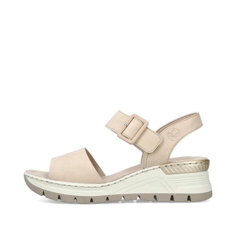 Beige Rieker women´s wedge sandals 66466-60 with a hook and loop fastener. Outside of the shoe.