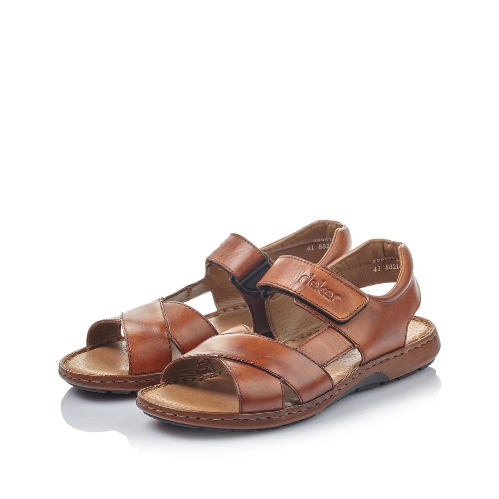 Maroon Rieker men´s sandals 28963-24 with a hook and loop fastener. Shoes laterally.