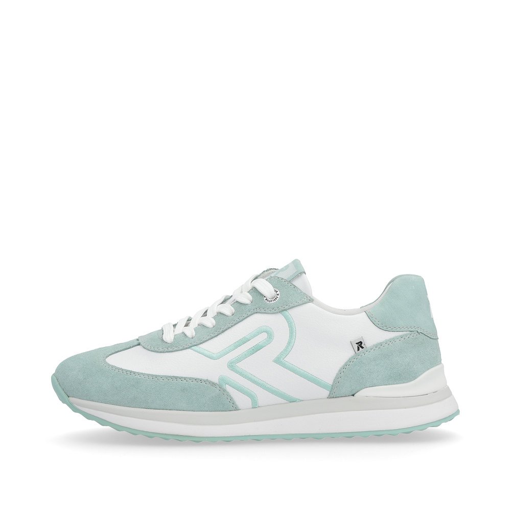 White Rieker women´s low-top sneakers 42509-81 with a flexible sole. Outside of the shoe.