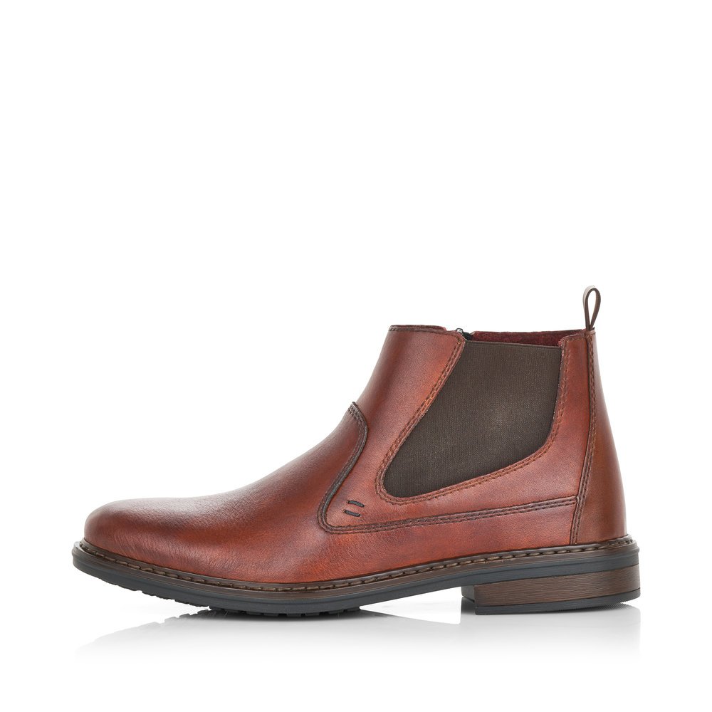 Coffee brown Rieker men´s Chelsea boots 37662-24 with shock-absorbing sole. The outside of the shoe