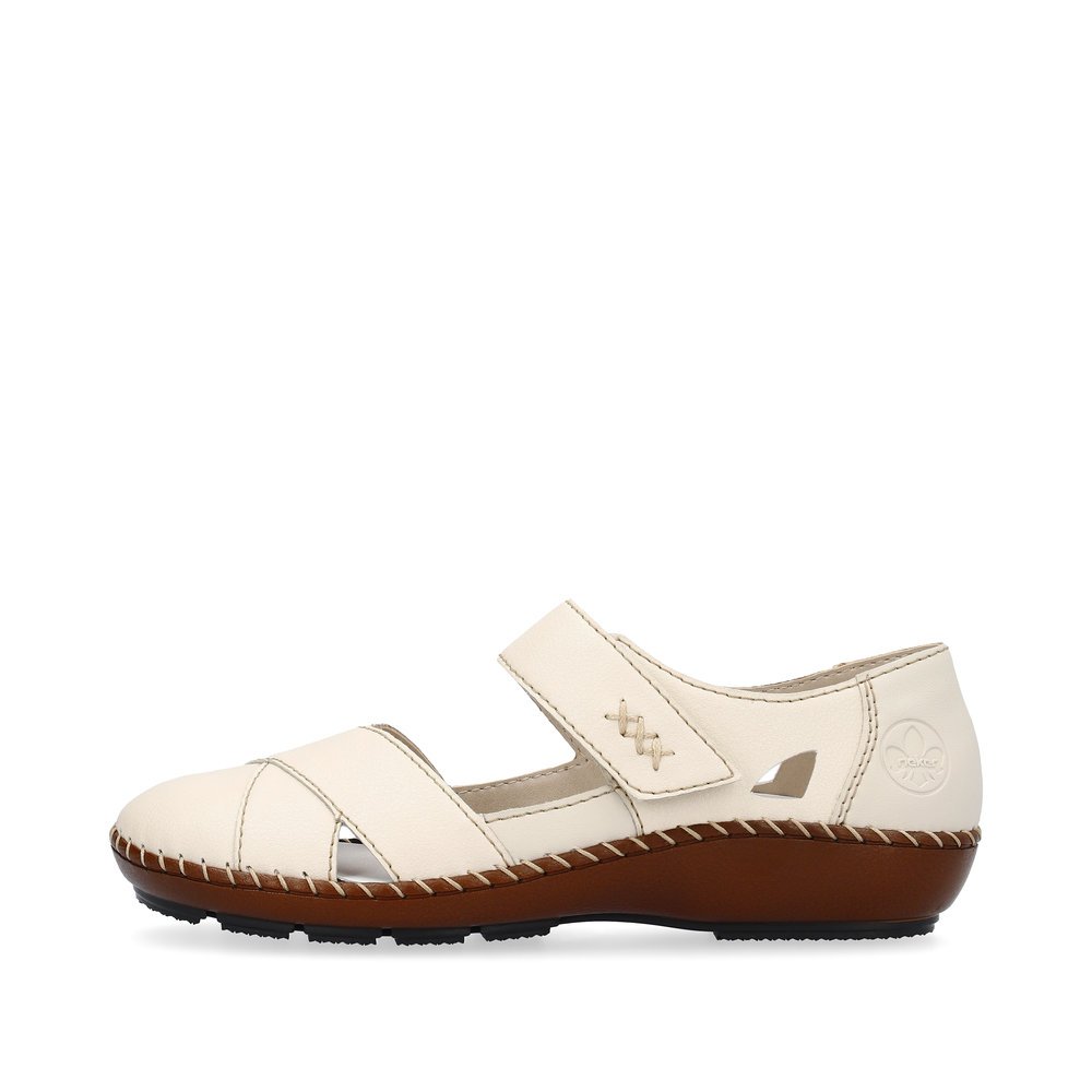 Light beige Rieker women´s ballerinas 44879-60 with a hook and loop fastener. Outside of the shoe.