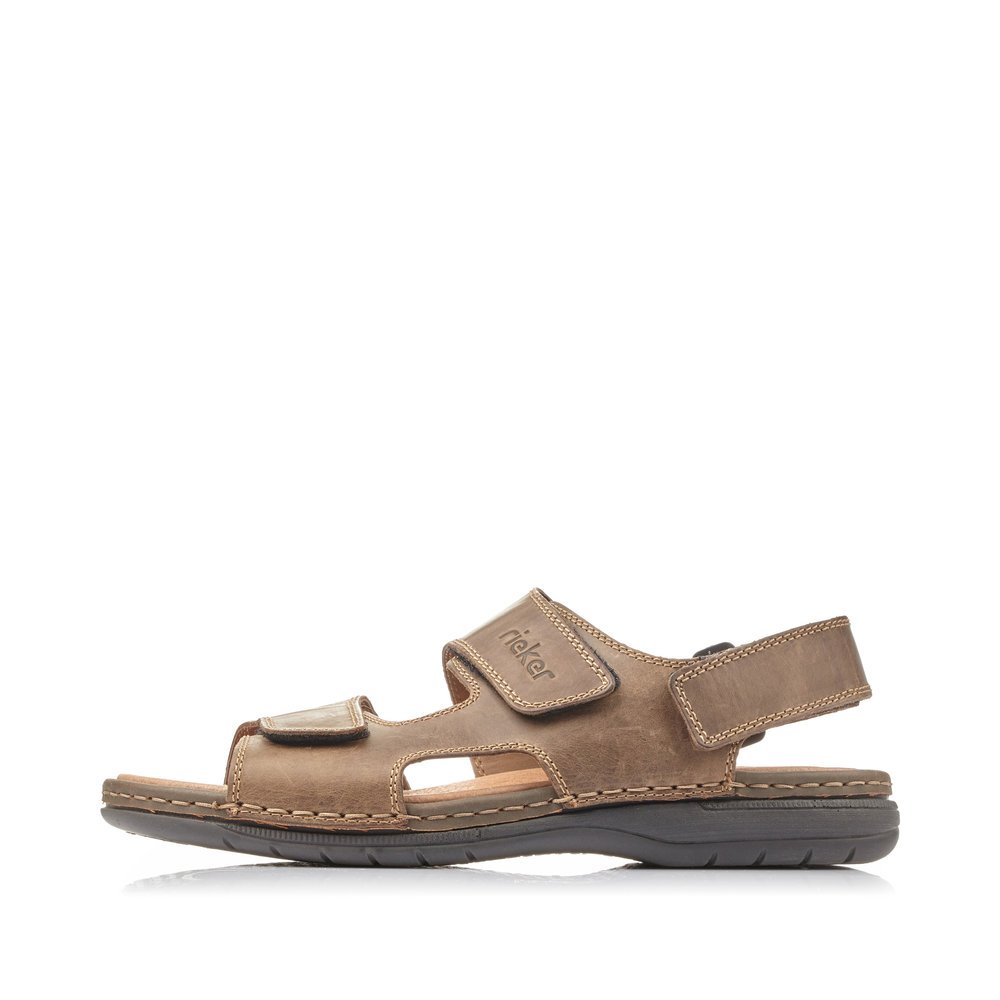 Brown Rieker men´s sandals 25558-25 with a hook and loop fastener. Outside of the shoe.