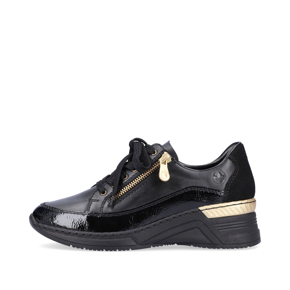 Jet black Rieker women´s sneakers N4330-00 with shock-absorbing platform sole. The outside of the shoe