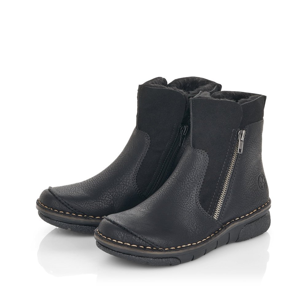 Night black Rieker women´s ankle boots 73381-00 with zipper as well as profile sole. Shoe laterally
