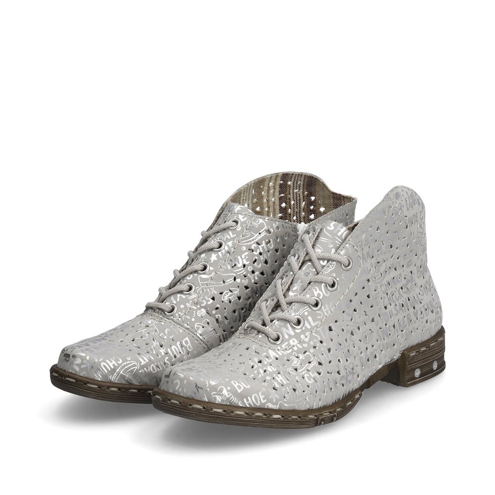 Rieker chaussures à lacets argent femmes M1835-92 avec fermeture éclair. Chaussures inclinée sur le côté.