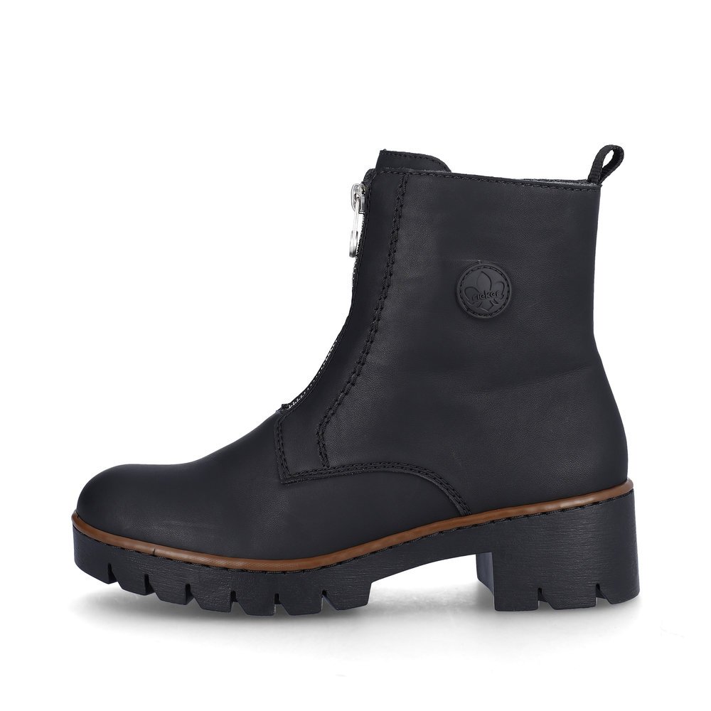 Jet black Rieker women´s ankle boots X5754-00 with profile sole with block heel. The outside of the shoe