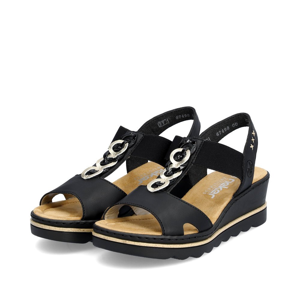 Jet black Rieker women´s wedge sandals 67498-00 with an elastic insert. Shoes laterally.