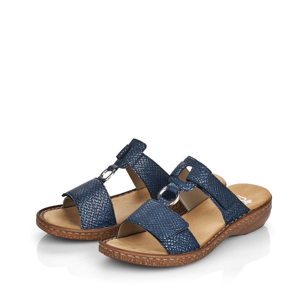 Slate blue Rieker women´s mules 628P9-14 with a hook and loop fastener. Shoes laterally.