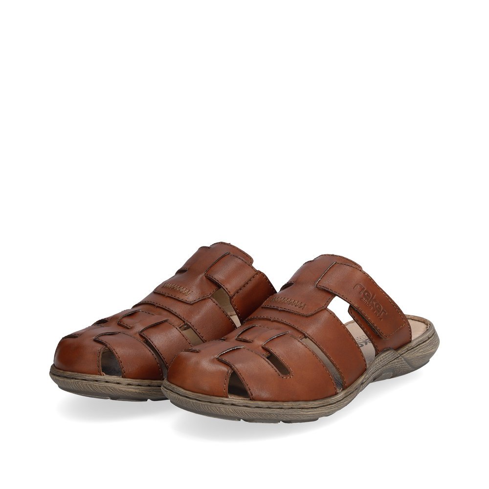 Maroon Rieker men´s mules 22087-24 with a hook and loop fastener. Shoes laterally.